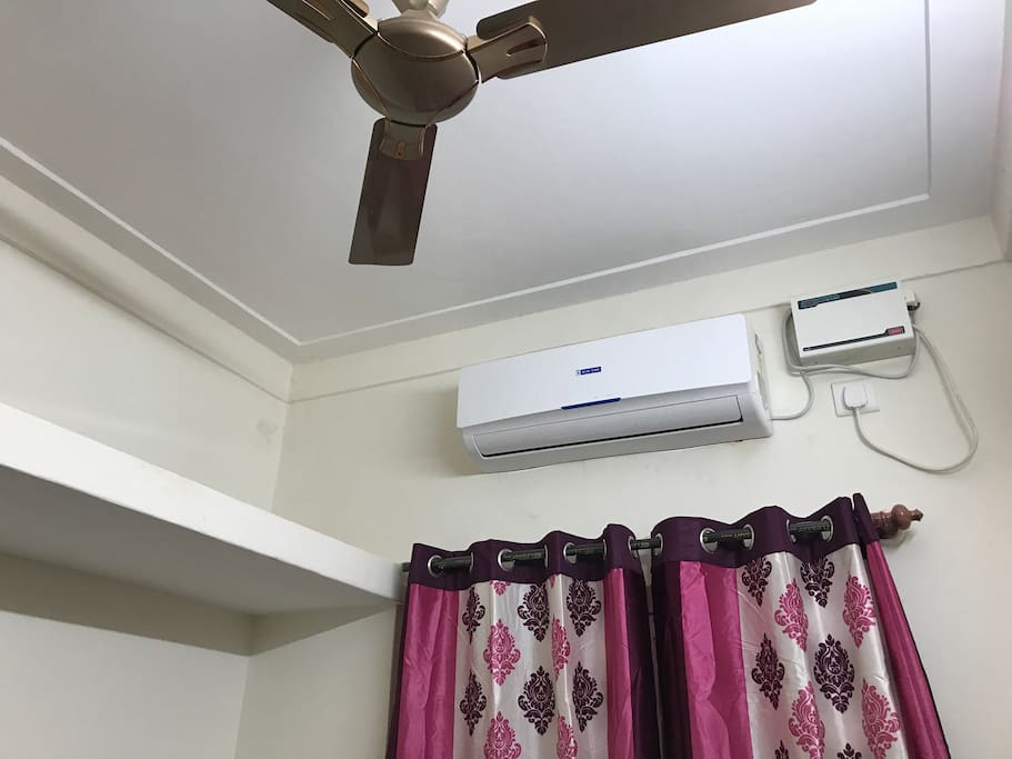 Air conditioning and blinds - a brand new Havells ceiling fan to complement