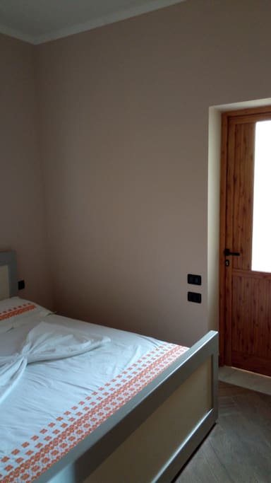 Bedroom and the balcony's door