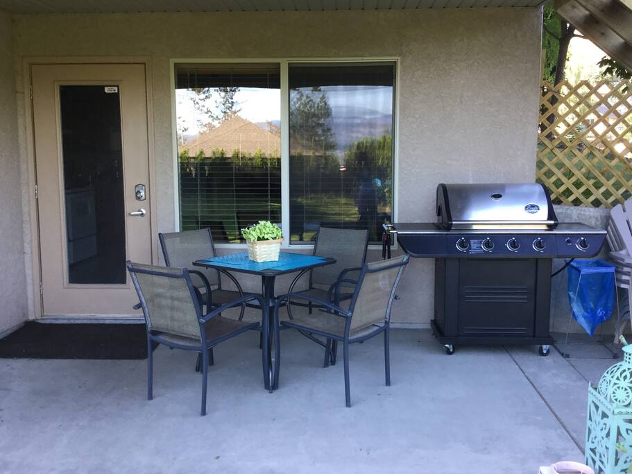 Comfortable covered patio with private entrance and BBQ for your exclusive use