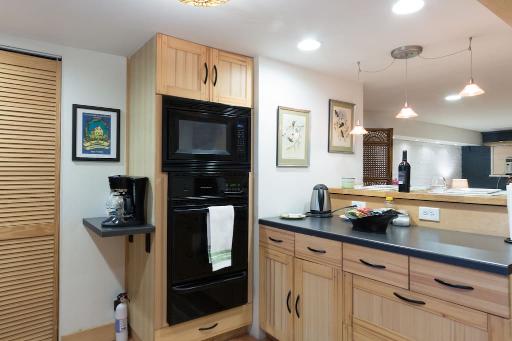 Gas oven, microwave and coffee bar.