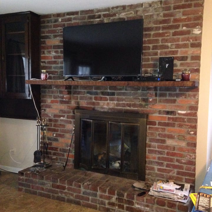 Fireplace with 50 inch TV, cable and wifi.