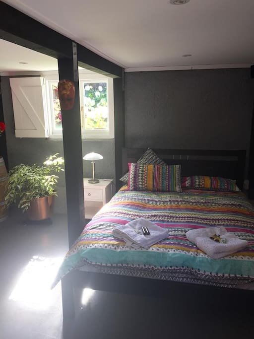 Queen sized bed with linen and towels supplied