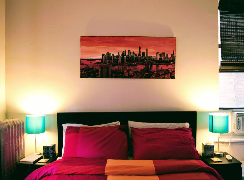 Large queen size bed in bedroom