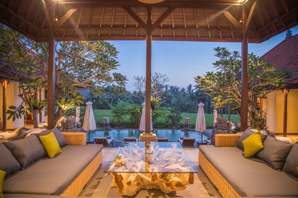 The outdoor lounge overlooking the property, facing the rice fields and the pool.