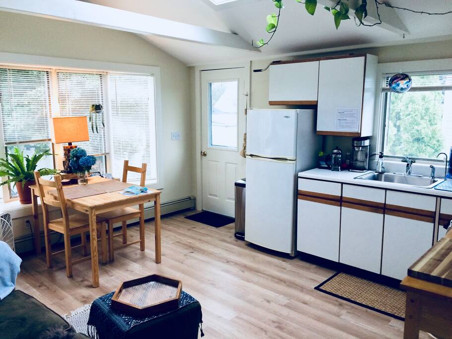 From the front door, enter into a sunny oasis, simply decorated, comfortable and outfitted with basic snacks, coffee and tee. A comfortable table looks out over the garden—a perfect place to enjoy a meal or to get plenty of work done.