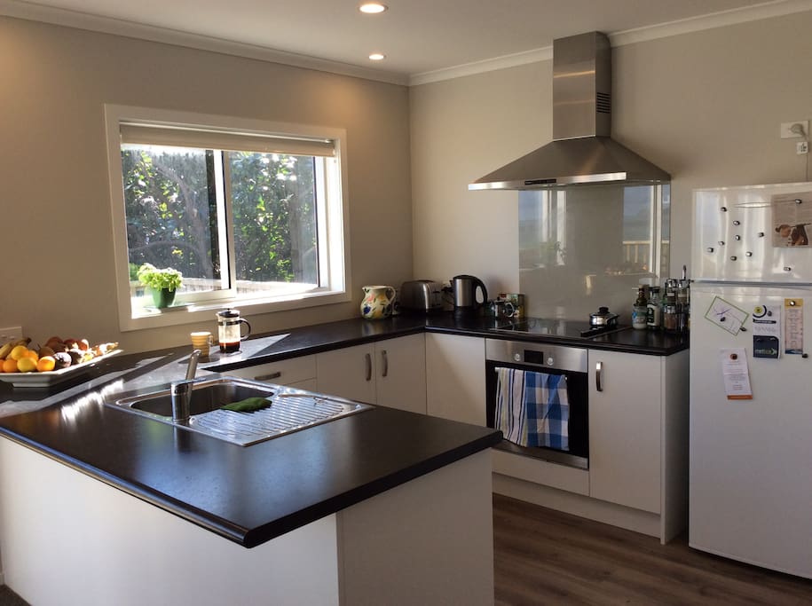Modern open plan kitchen. Make yourself at home.