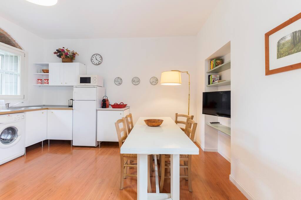 The Living room & The Kitchen - The dining table