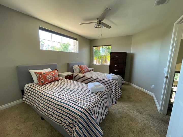 Bedroom with 2 twin XL beds and attached Jack and Jill Bathroom
