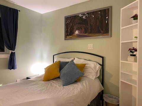 Cozy private bedroom with shared bathroom
