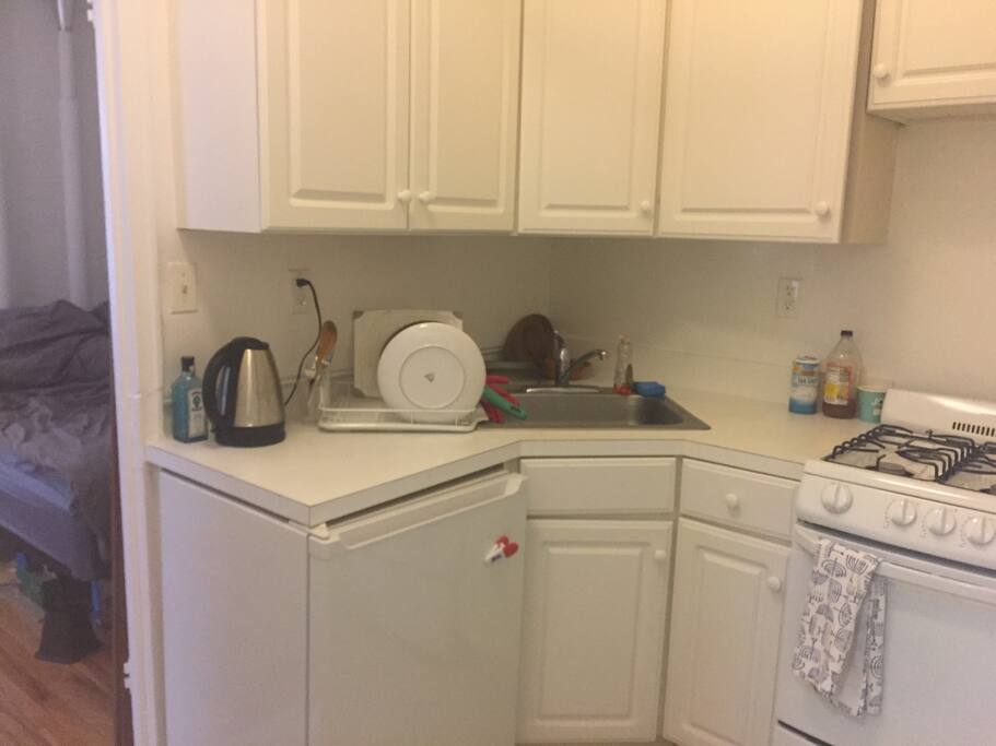 Full dish and cookware sets for guests to use for cooking.