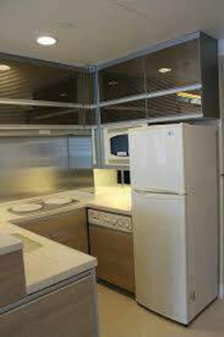 You could use our washing machine, refrigerator and the full kitchen.