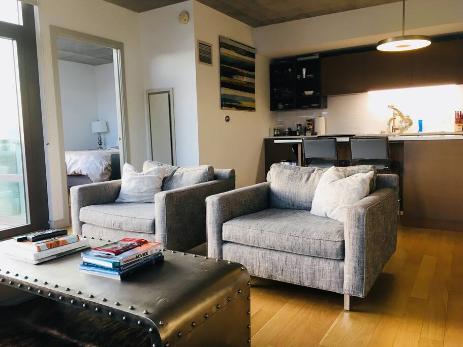 Open concept living room - looking into kitchen.