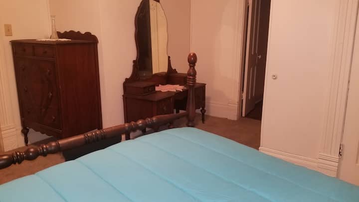 Master bedroom and door to full bath