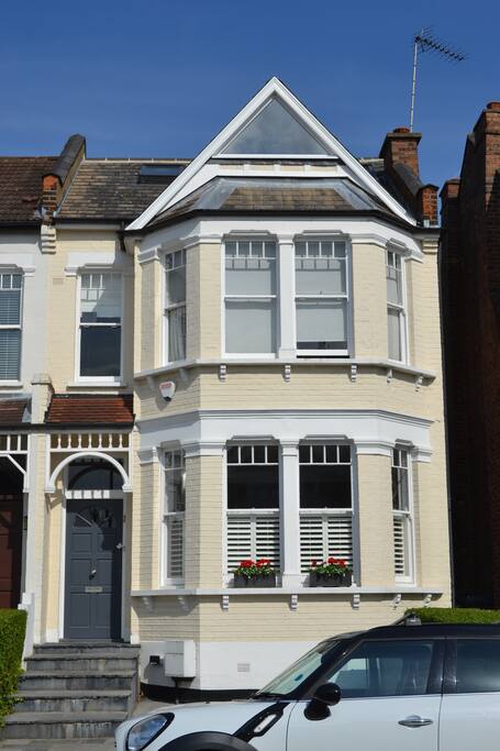Front of house, dining room / lounge (downstairs bay window), master ensuite (upstairs bay window), large single bedroom (triangle window)