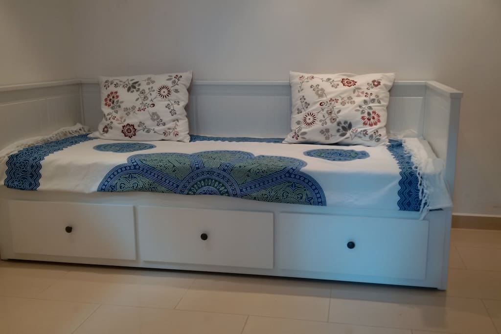 This brandnew bed can be used as a sofa during the day