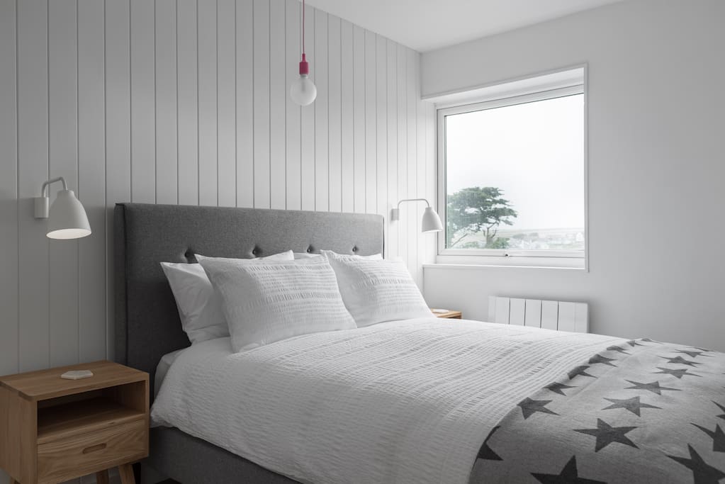 King size bedroom - partial sea/beach view
