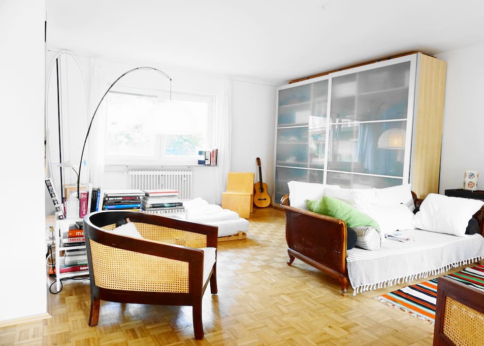 The comfy couch invites you to sit back and put up your feet.