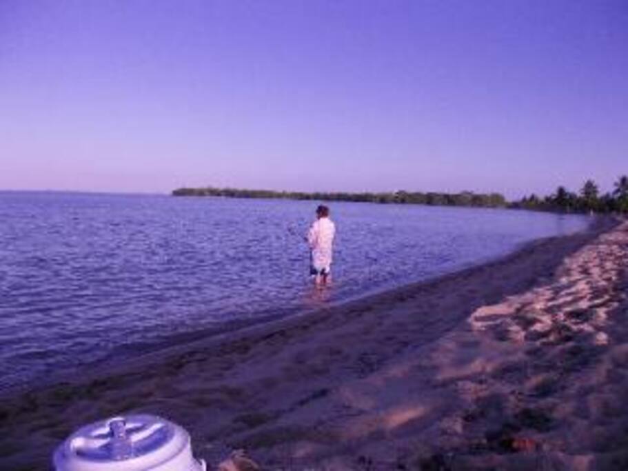 Our guest fishing from the beach