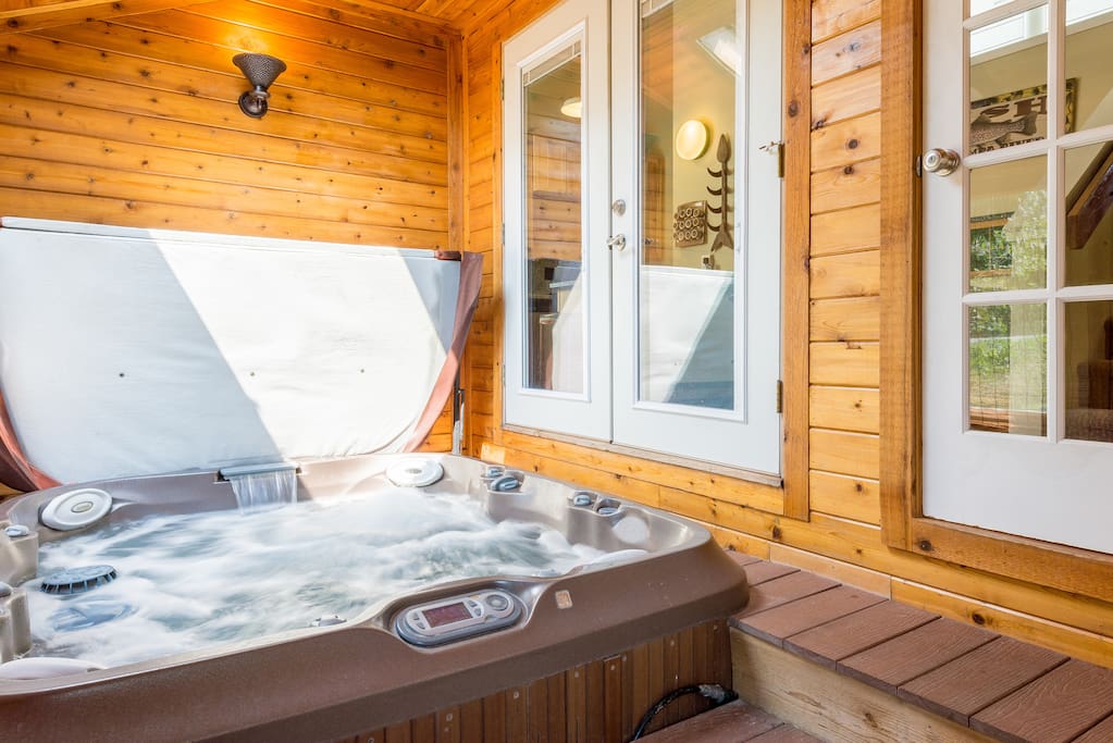 Relax in the hot tub on the back deck.