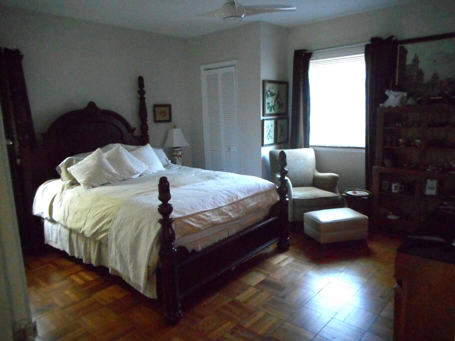 Queen bed with flat screen TV