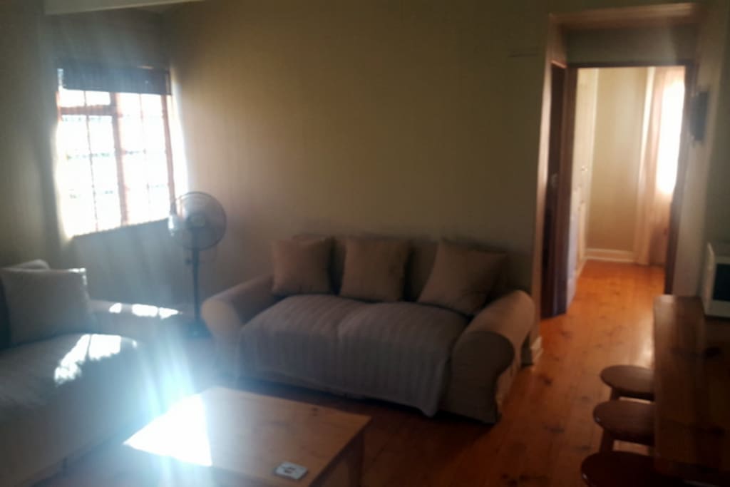 Warm and comfortable open plan lounge and kitchen