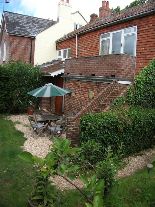 Access via rear of property, private garden and seating area