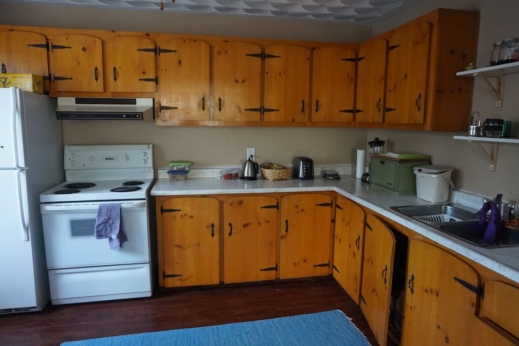 Kitchen with washer and dryer