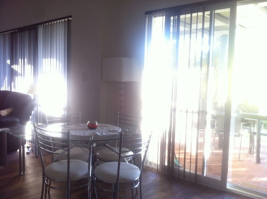 Gorgeous winter light in shared dining area.