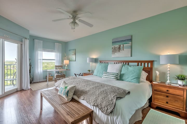 Sunset Suite is what we call our Master bedroom! Gorgeous sunsets are viewed here from the window and slider.
