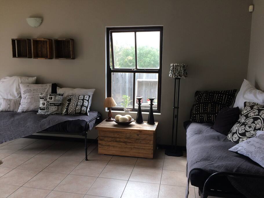Two old style farm beds with comfy new mattresses and plenty pillows to relax or use as additional sleeping space.