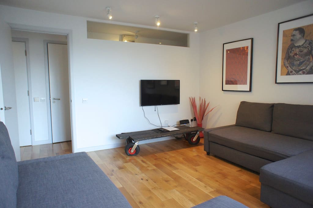 Here's your living room with two double sofa beds