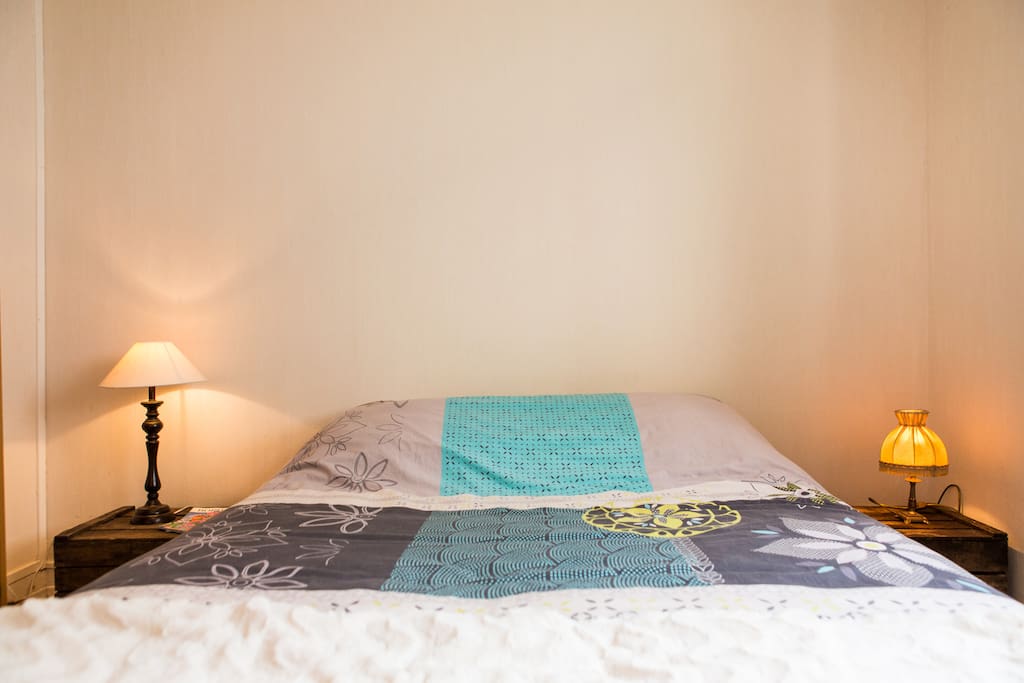 Sunny bedroom with large windows