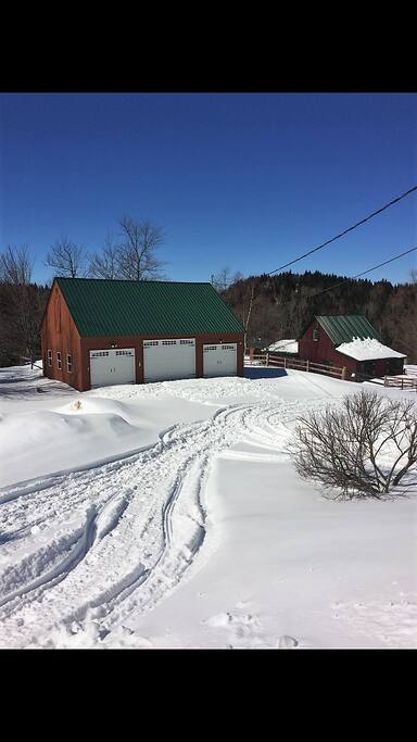 Detached 3 Stall Garage and a Horse Barn.