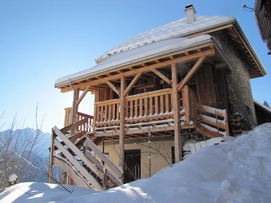 Side view of entrance and south facing balcony