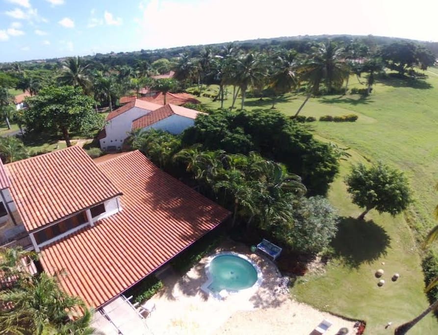 Aereal view of villa and its backyard.