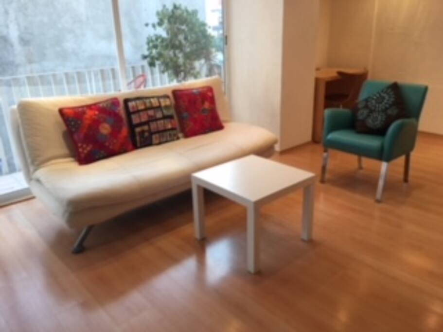 Estancia con sofá cama