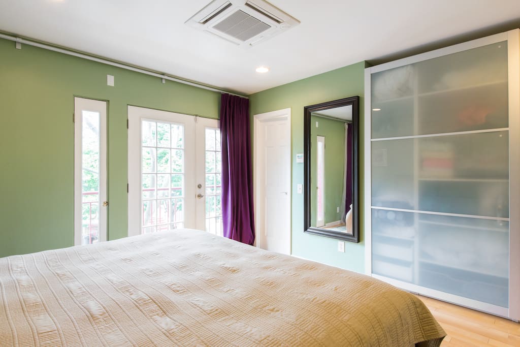Sun-drenched Master Bedroom with large closet and Juliet balcony and en-suite bathroom