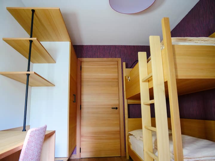 The small bedroom with bunk bed