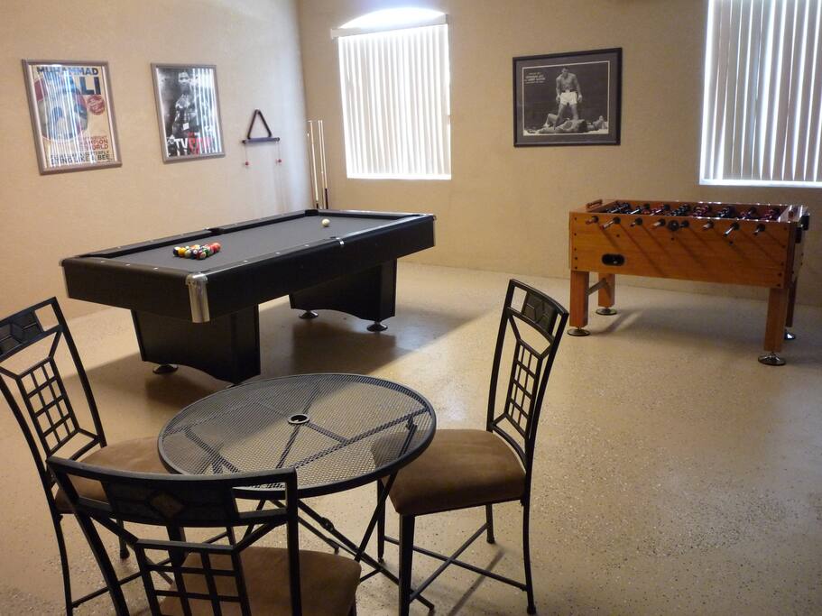 Games Room with 7ft x 3 1/2 ft slate pool table and foosball