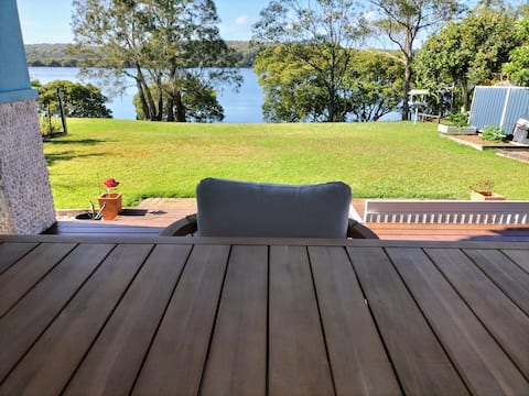 Tranquil Riverfront Retreat with Panoramic Views.