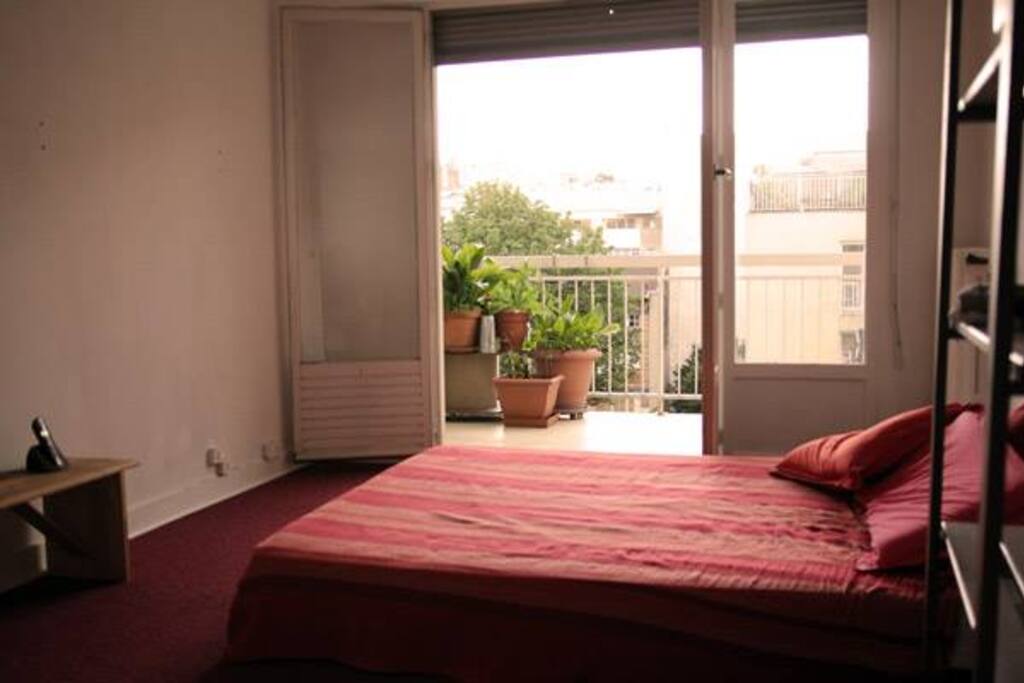 Access to the balcony from the bedroom.
