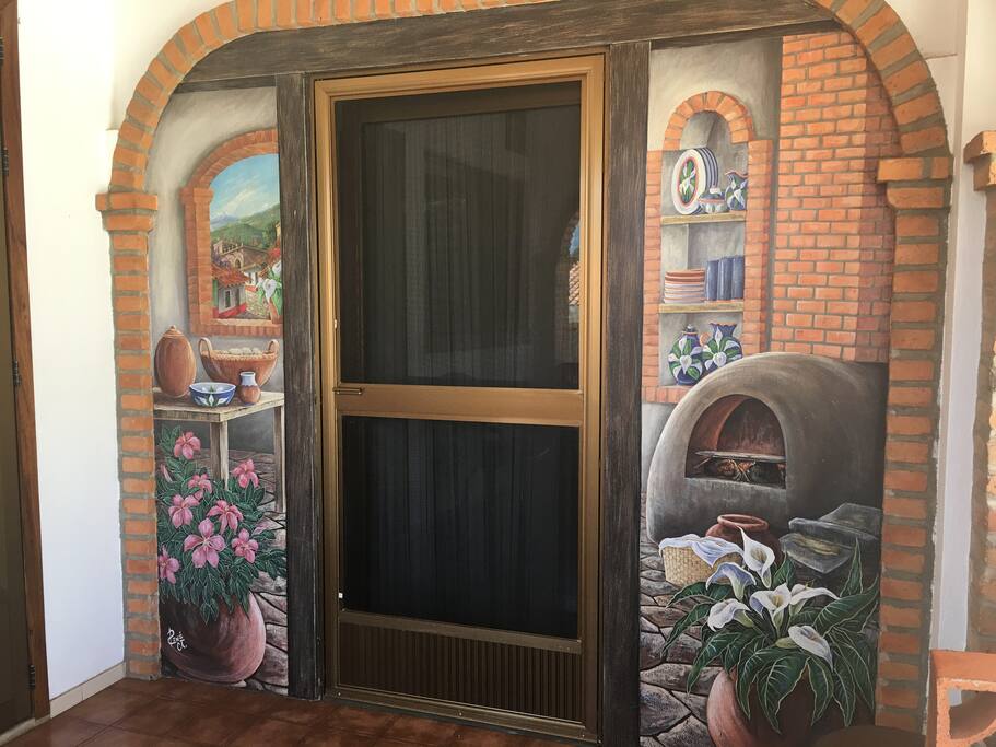 Paintings throughout condo