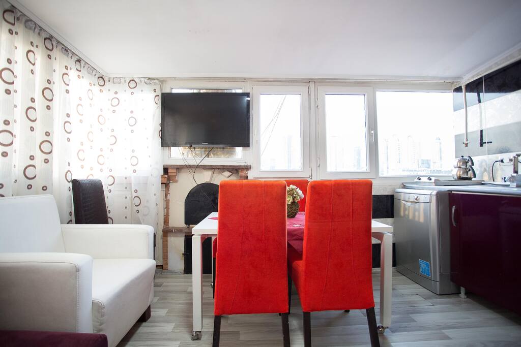 livingroom with big tv and air condition