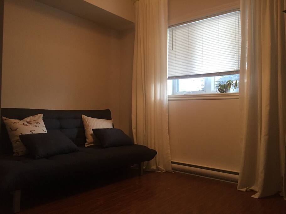 Chambre avec canapé lit