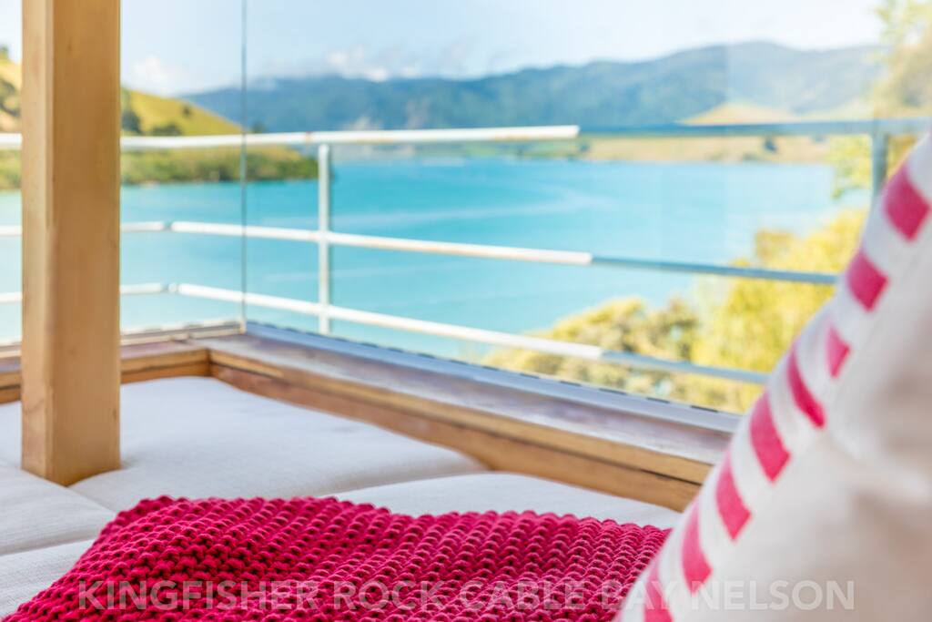 Enjoy the view or read a book in your private bay window with panoramic views of two bays.