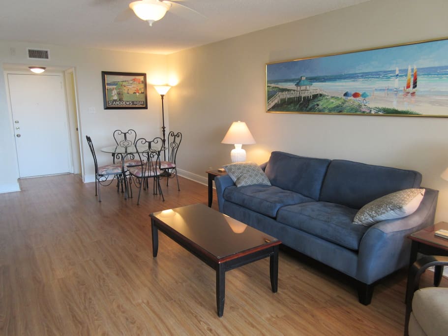 Living Room with Queen sleeper sofa. Dinette Area