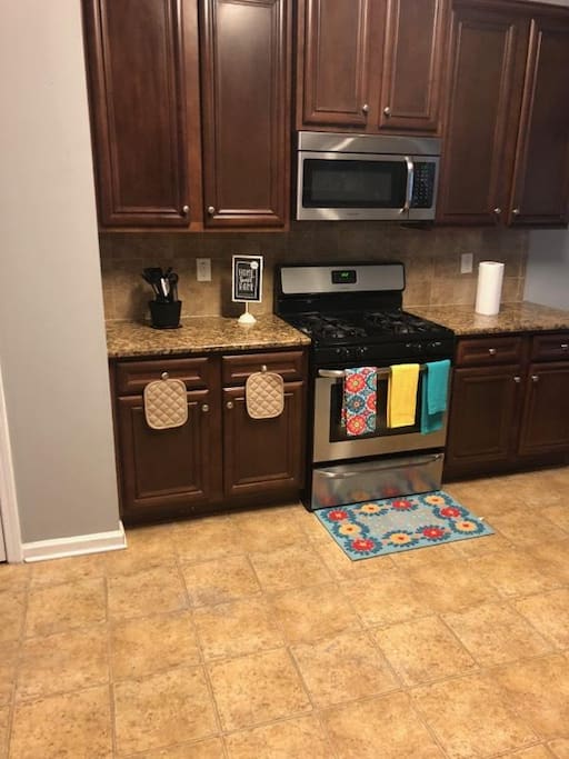 Beautiful kitchen with stainless steel appliances and granite counter tops