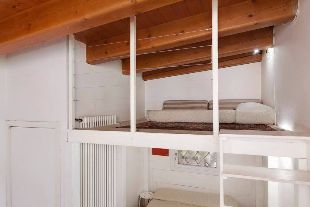 Bed on a mezzanine