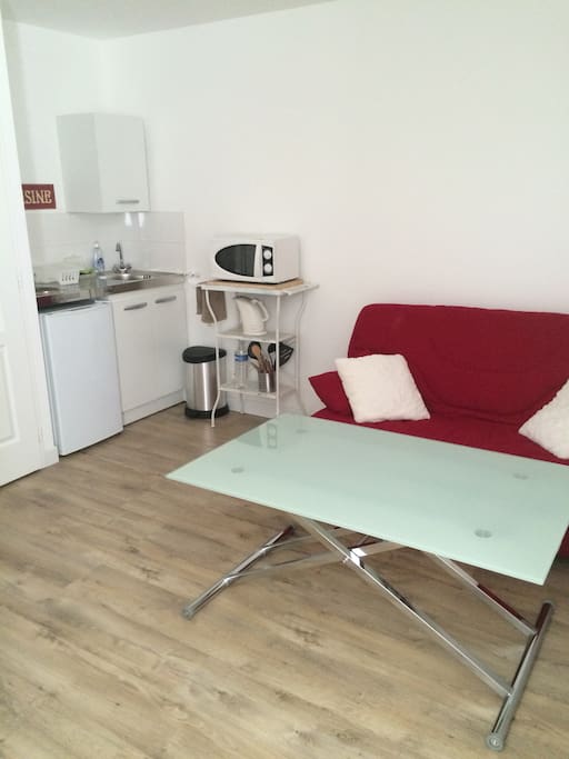 table pouvant se lever, ou se baisser