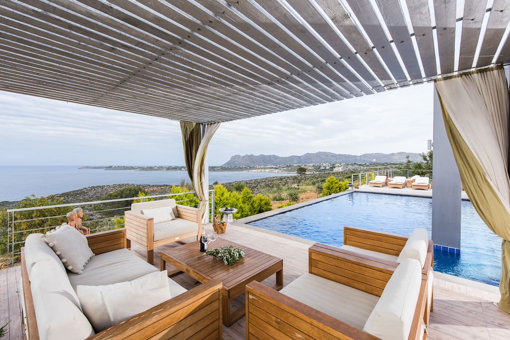 Patio by the pool with sea and mountain view